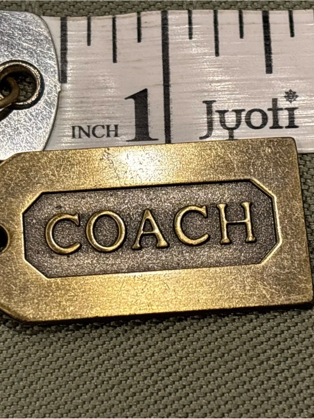 Coach brush gold